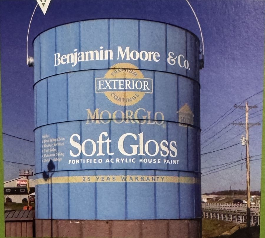 The giant paint can with its MoorGlo Soft Gloss Exterior House Paint label (By 2016)