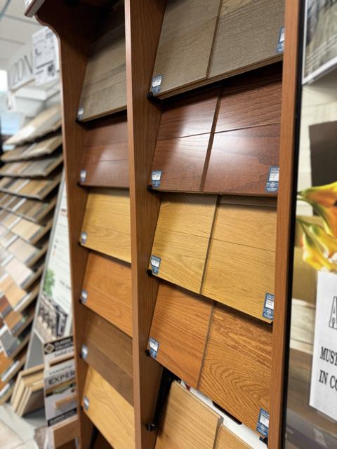 A Somerset Color Plank display of solid and SolidPlus engineered oak in mocha, natural, and golden tones