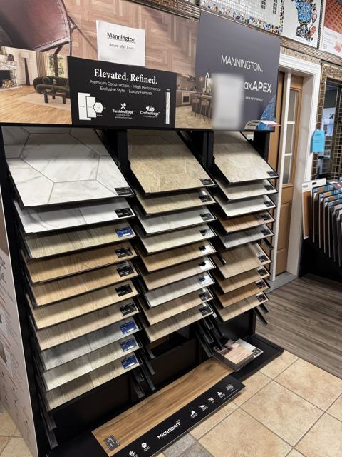 Mannington ADURA Max APEX luxury vinyl display with hexagon and wood-look samples